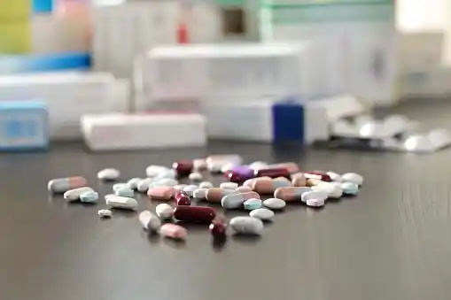 various pills scattered on a table